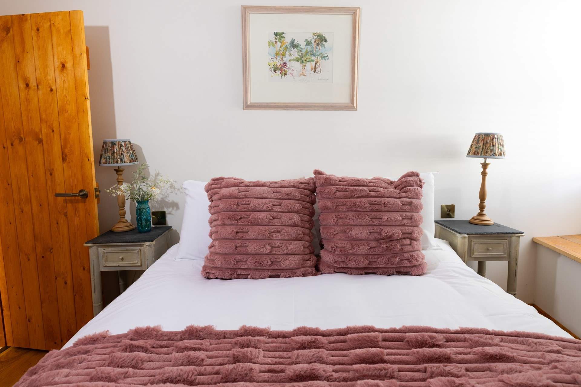 Sweet dreams await in this charming room.