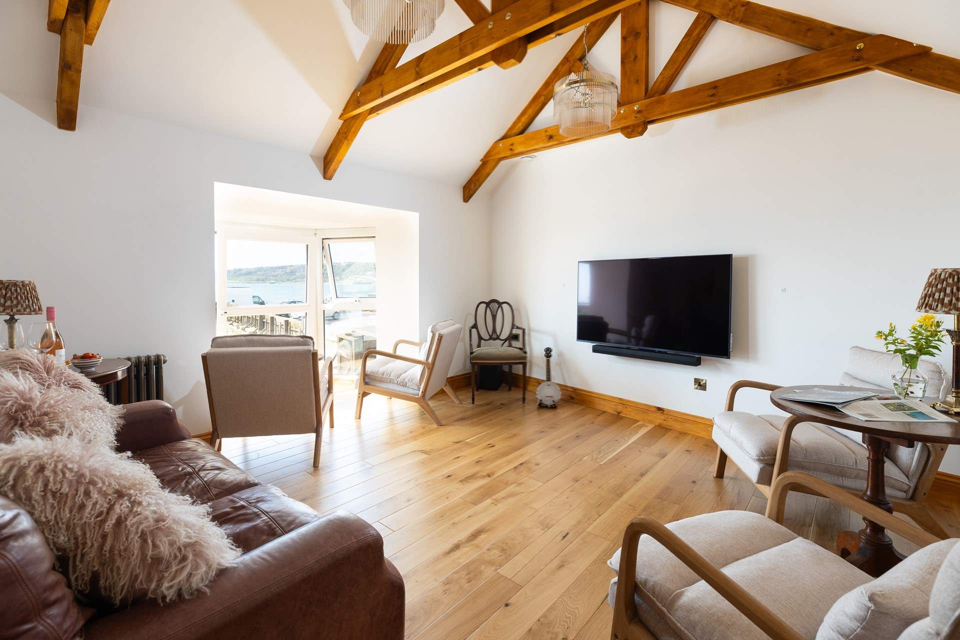 Filled with light and designed for comfort, this beautiful home offers a relaxing coastal retreat.