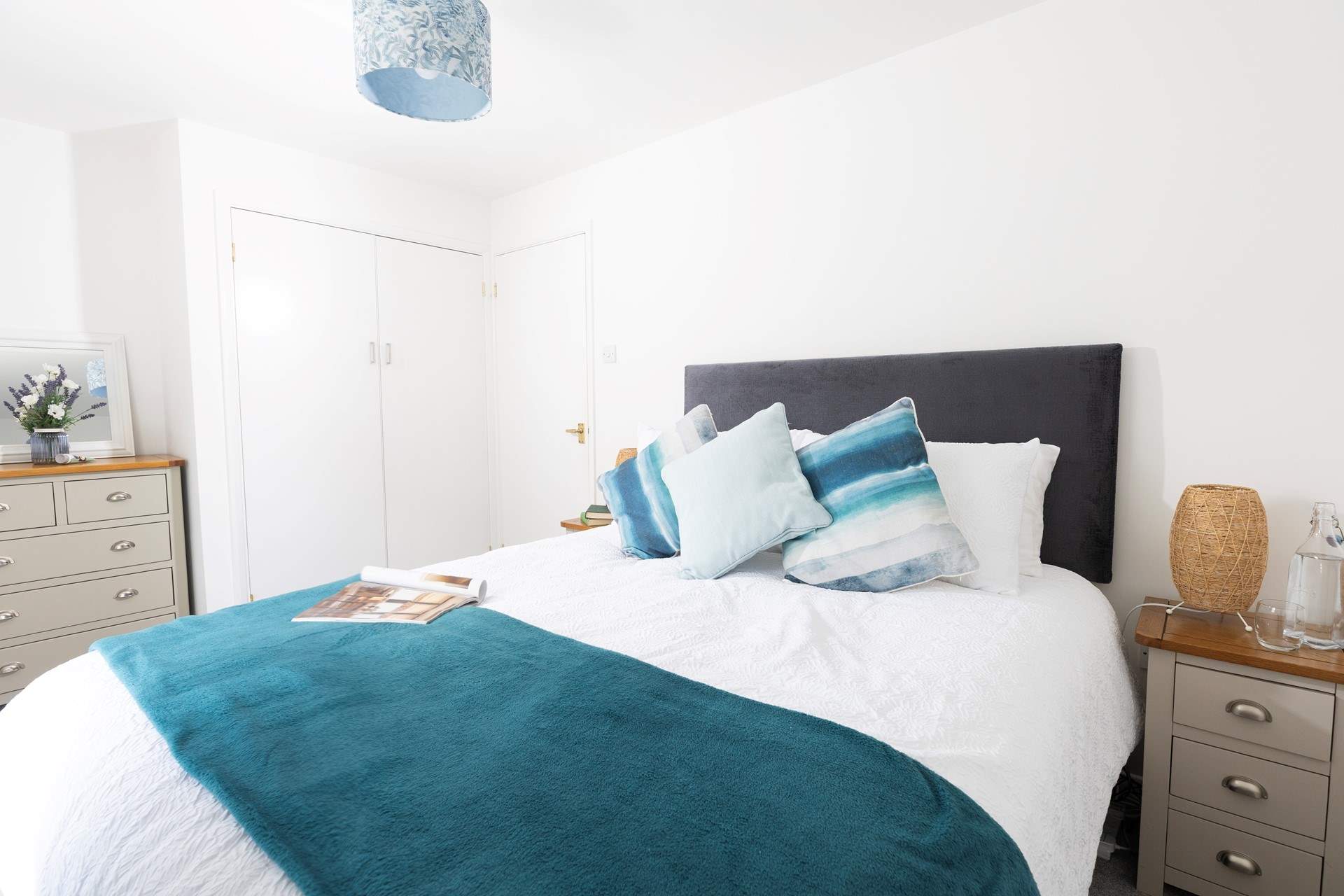 The main bedroom has a king-size bed. 