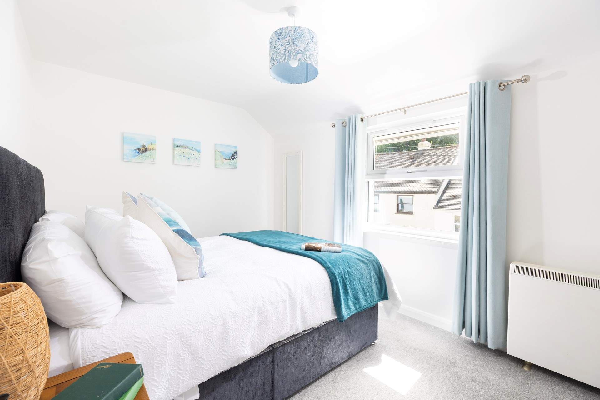 Morning light floods into this bedroom. 