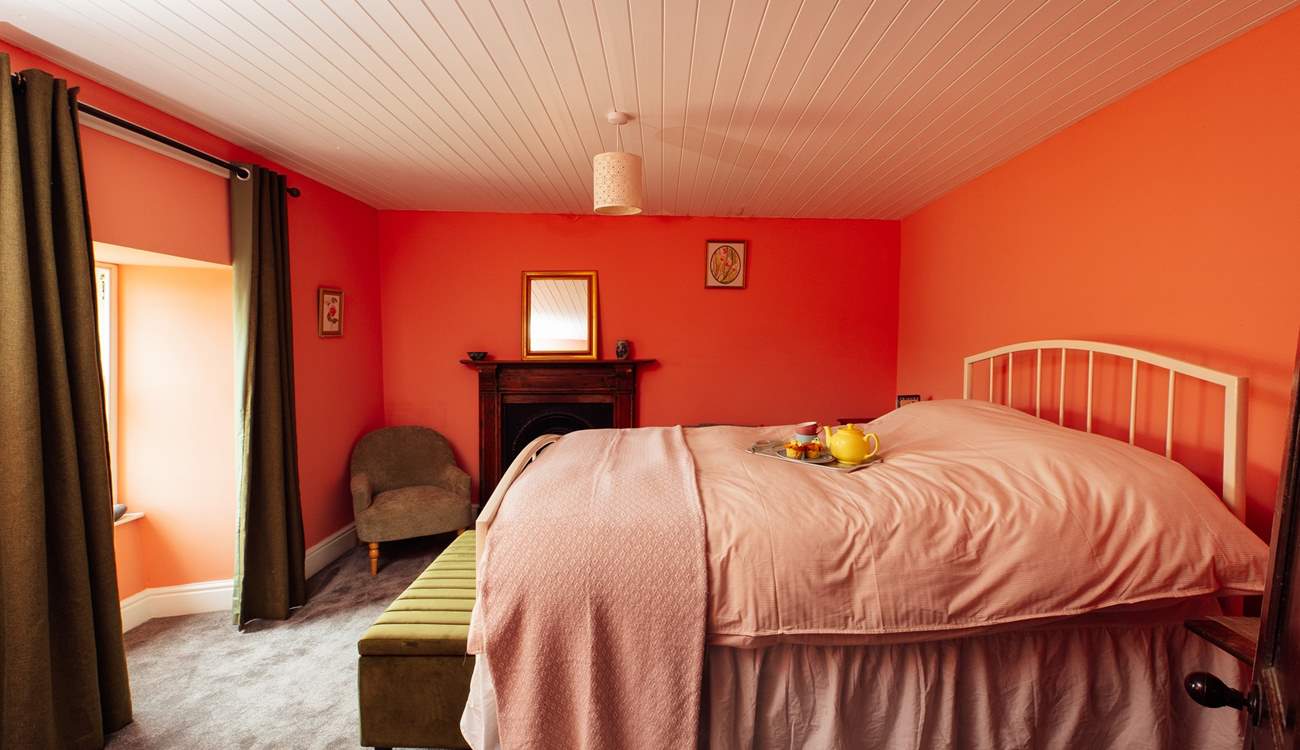 Slow holiday mornings in the sea facing, high double bed on the first floor. 