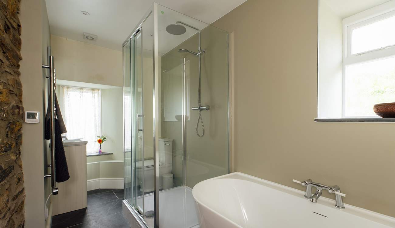 Contemporary bathroom with deep bath and shower. Ideal for some holiday pampering. 