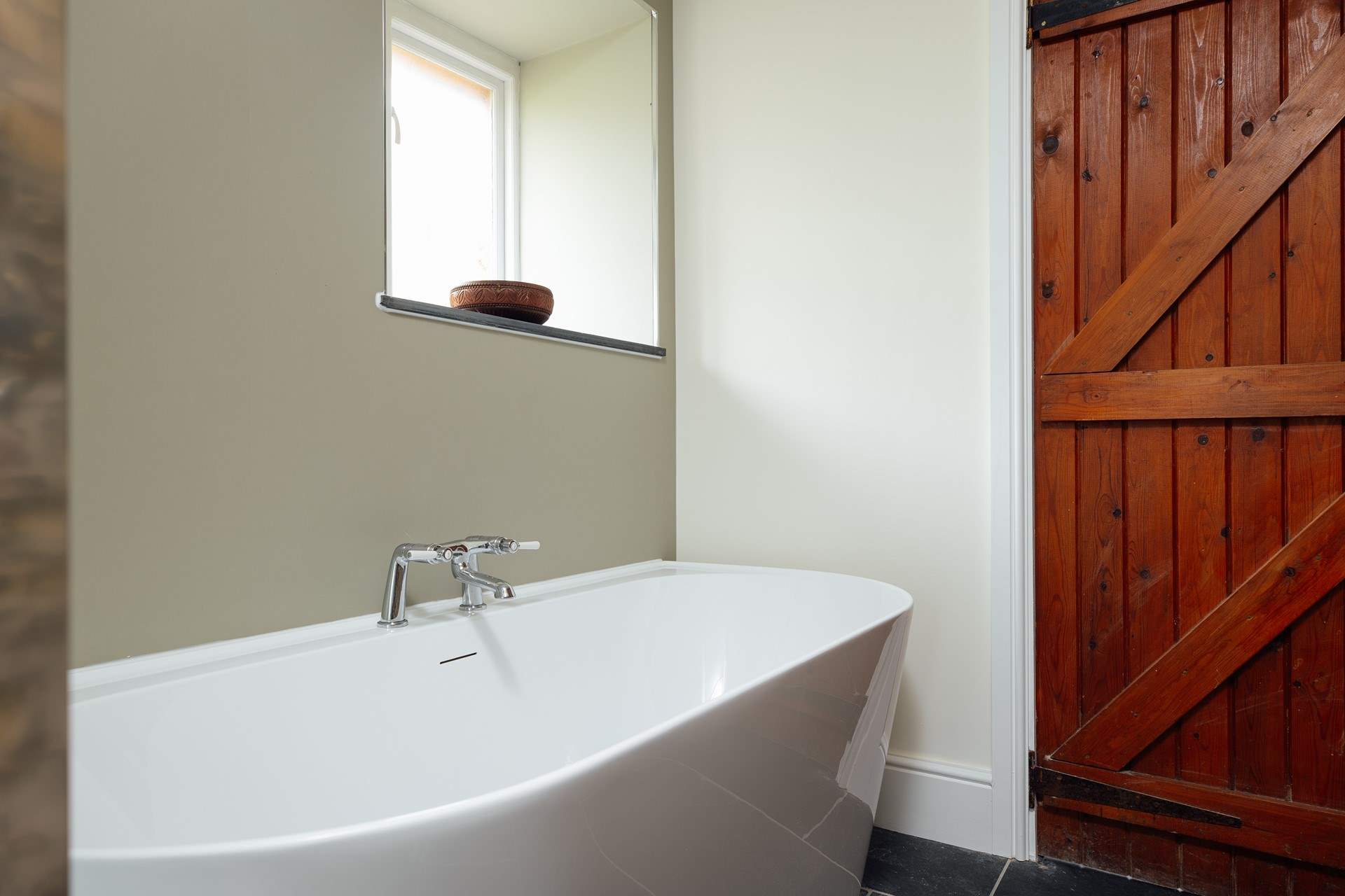 Relax in a luxurious bubbly bath after a day's exploring.