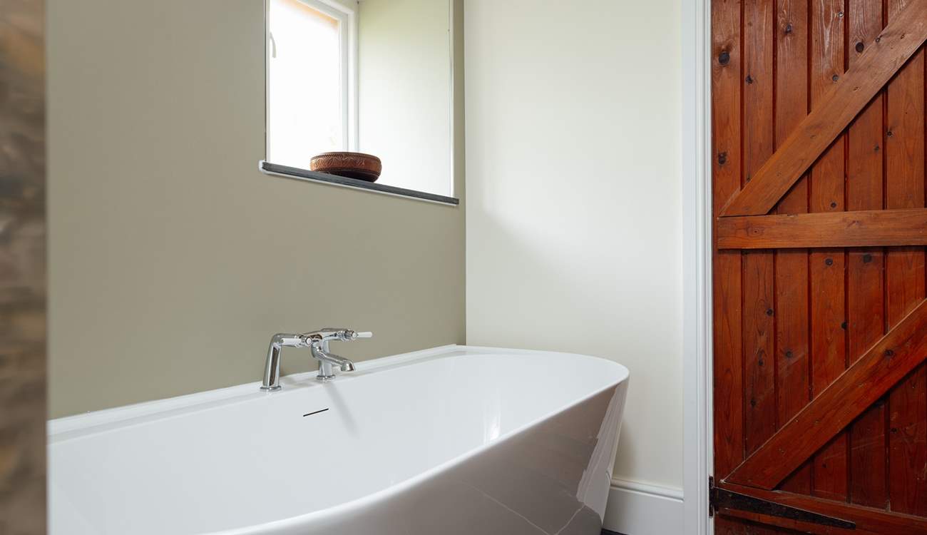 Relax in a luxurious bubbly bath after a day's exploring.