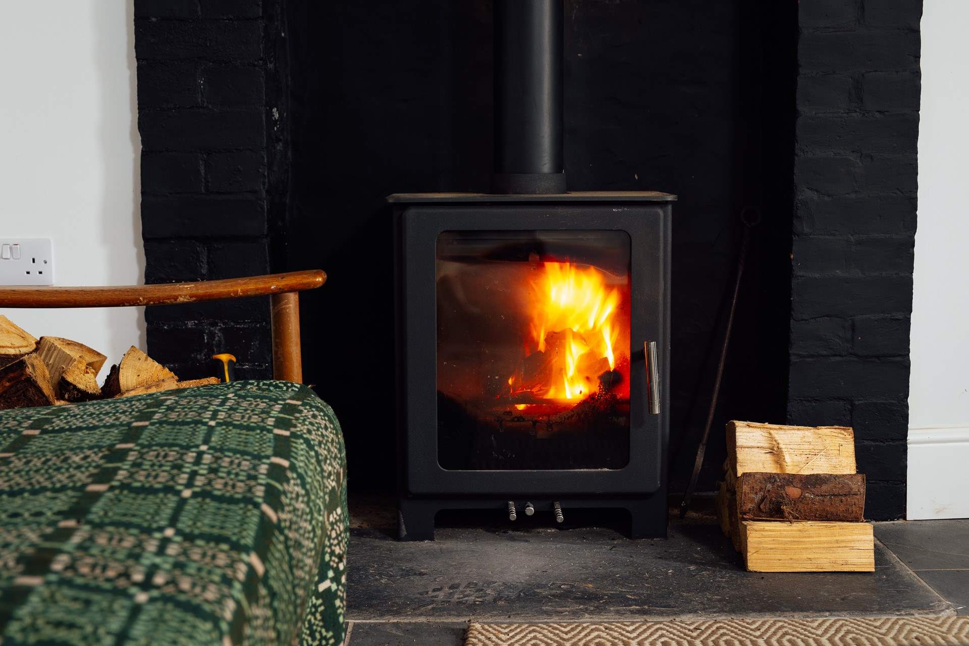 Gather around the warming glow of the cosy wood-burner after swimming in the sea, 