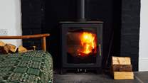 Gather around the warming glow of the cosy wood-burner after swimming in the sea, 