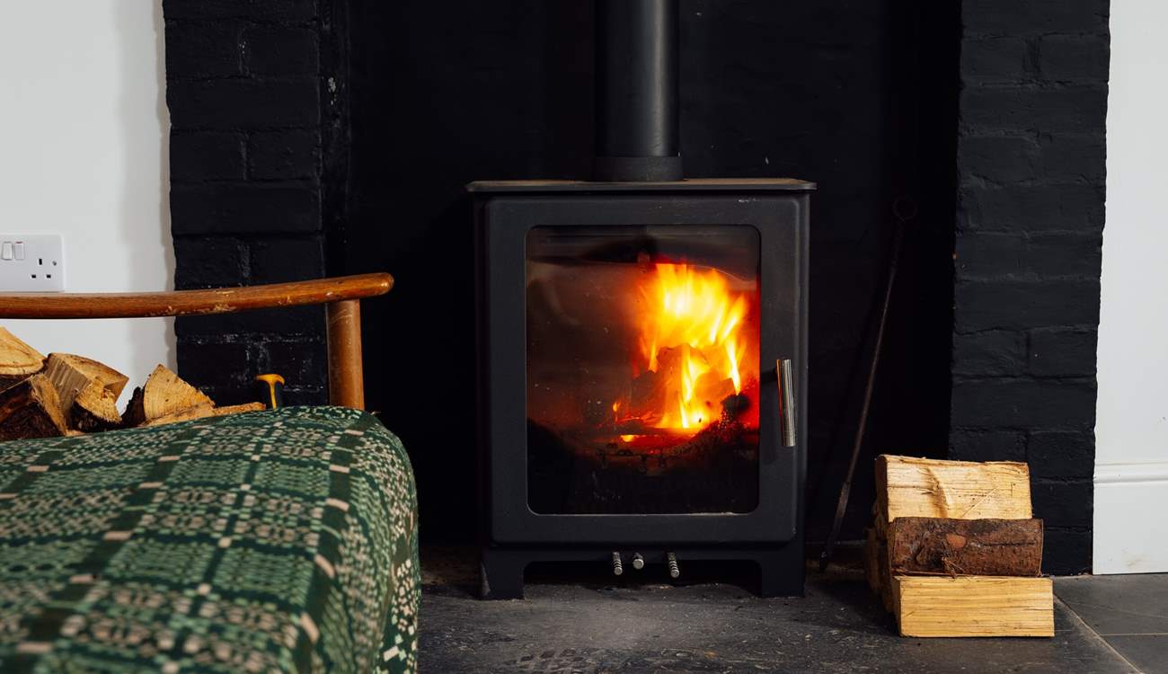 Gather around the warming glow of the cosy wood-burner after swimming in the sea, 