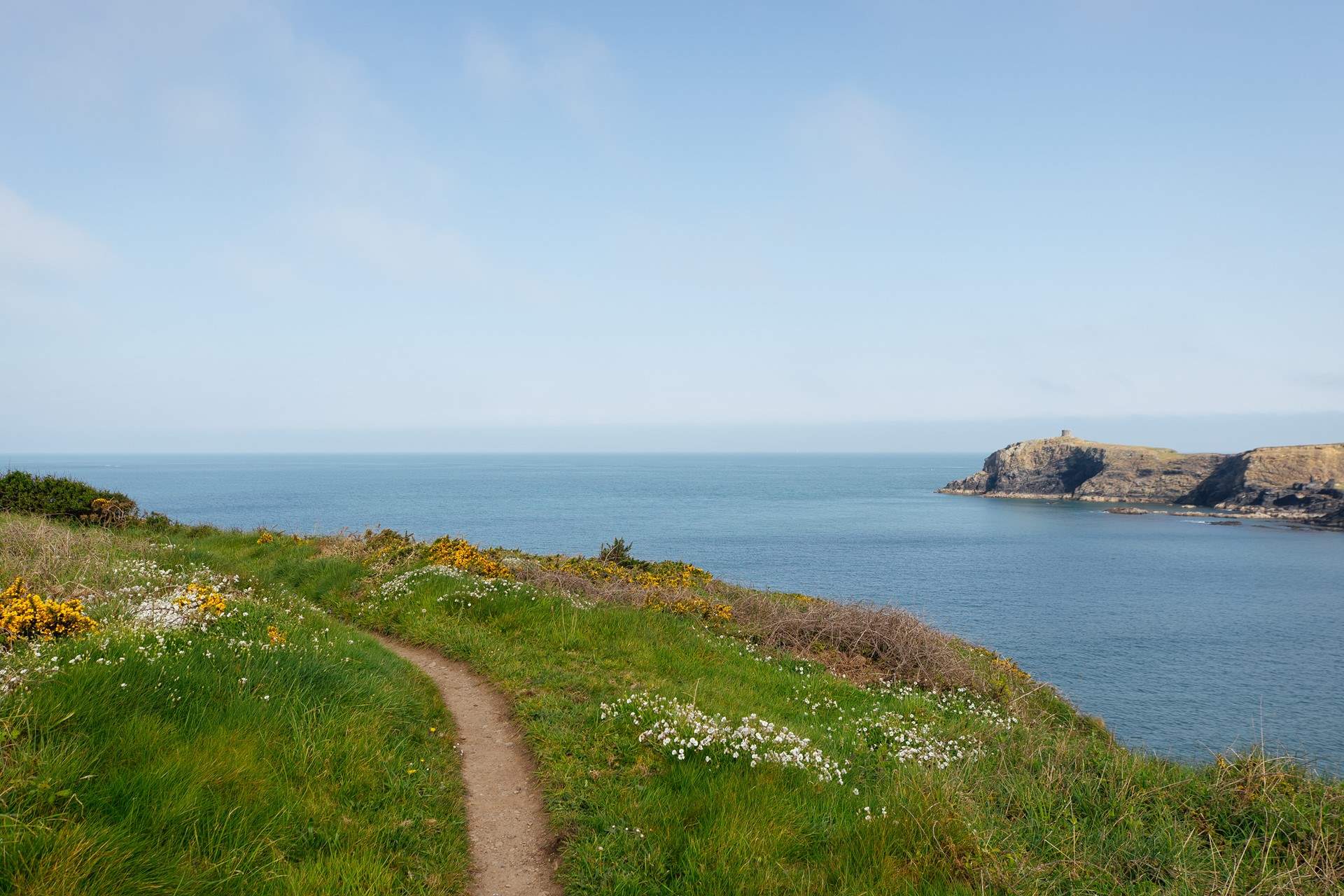 From The Beach House, follow the coast path to discover spectacular views. This section is above Abereiddy Beach. 
