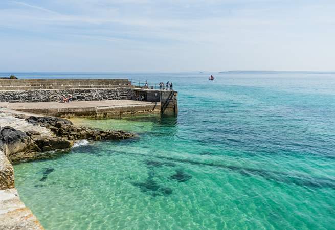 Soak up the sunshine in the turquoise waters in St Ives.