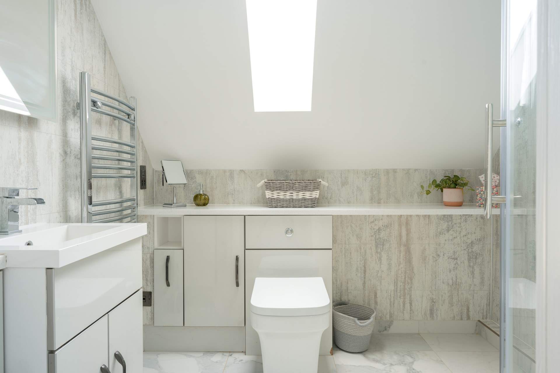 The stylish, modern shower-room on the top floor is simply stunning.