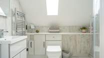 The stylish, modern shower-room on the top floor is simply stunning.