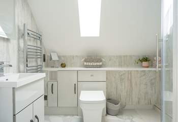 The stylish, modern shower-room on the top floor is simply stunning.