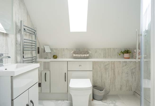 The stylish, modern shower-room on the top floor is simply stunning.
