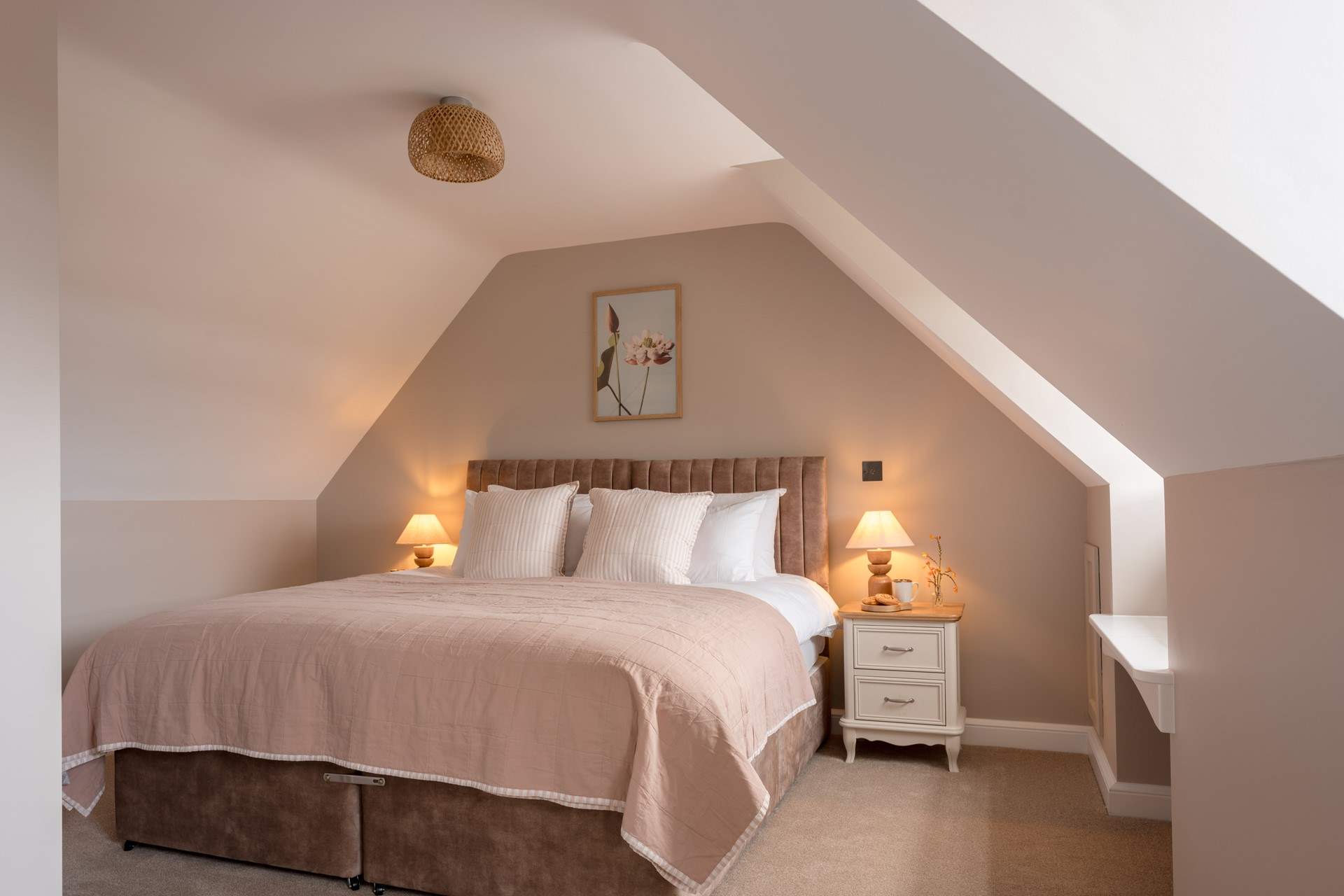 Soft earthy tones welcome you to one of six elegant bedrooms.