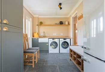 There is a fully equipped utility-room with an extra fridge/freezer.