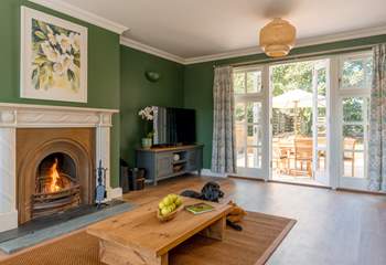 French doors open onto the back terrace, blending indoor comfort with outdoor living.