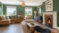 The sitting-room is filled with natural light and is thoughtfully designed.