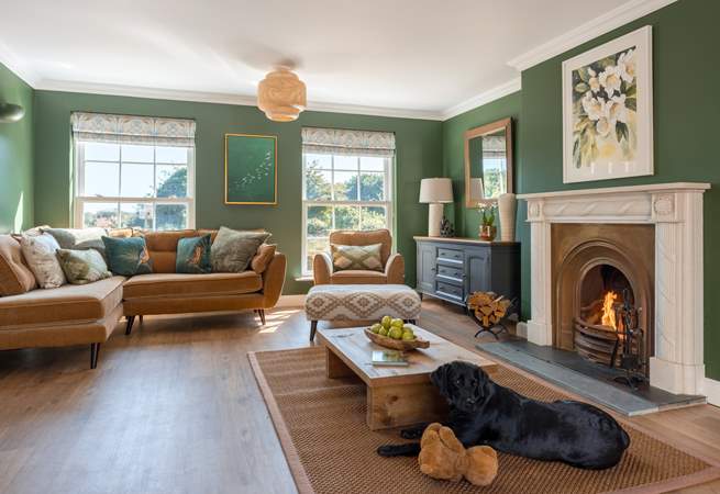The sitting-room is filled with natural light and is thoughtfully designed.