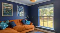 A cosy snug with Smart TV, the perfect hideaway for movie nights or just a little time to yourself.
