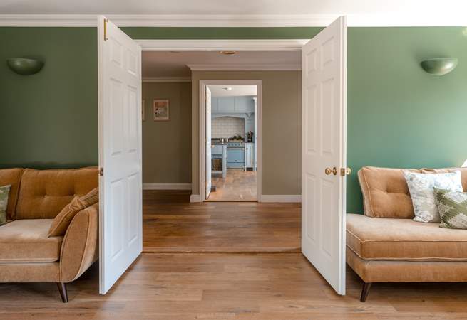 Cross the polished wooden floors into the kitchen.