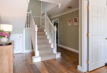 Head upstairs on the grand staircase.