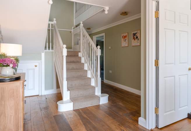 Head upstairs on the grand staircase.