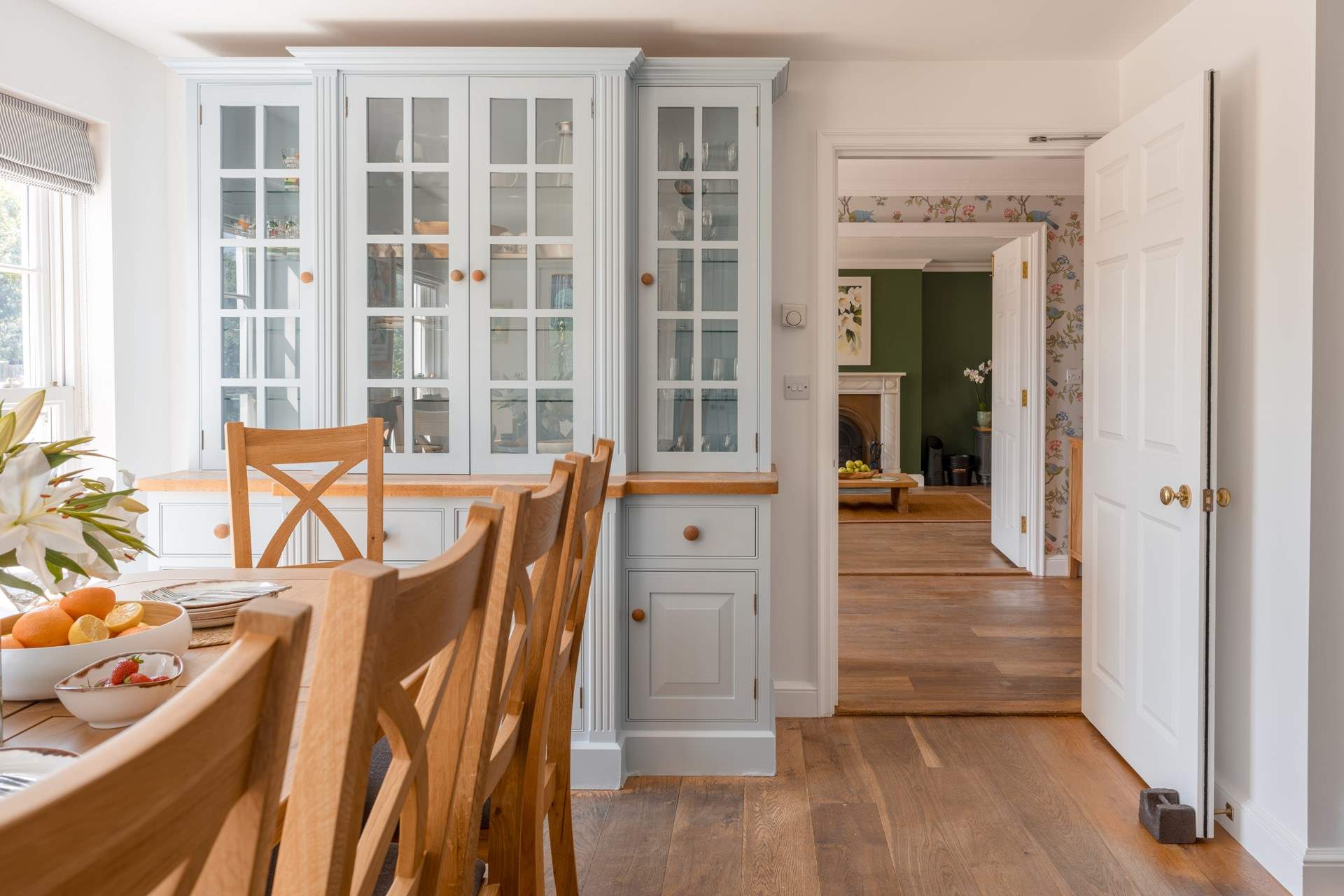 Polished wooden floors add warmth, character and timeless farmhouse charm.