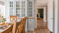 Polished wooden floors add warmth, character and timeless farmhouse charm.