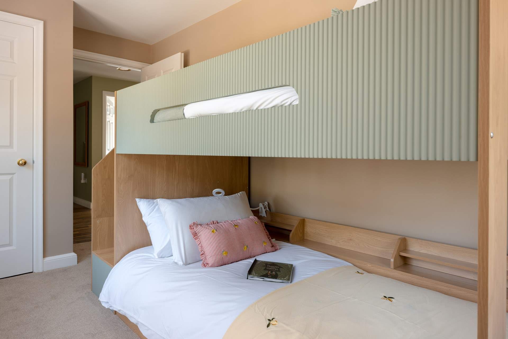 Bedroom 1 has contemporary bunk-beds, perfect for the little ones.