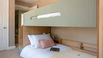 Bedroom 1 has contemporary bunk-beds, perfect for the little ones.