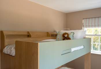 Complete with steps for ease to reach the top bunk!
