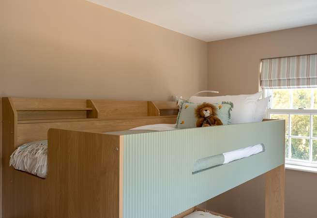 Complete with steps for ease to reach the top bunk!