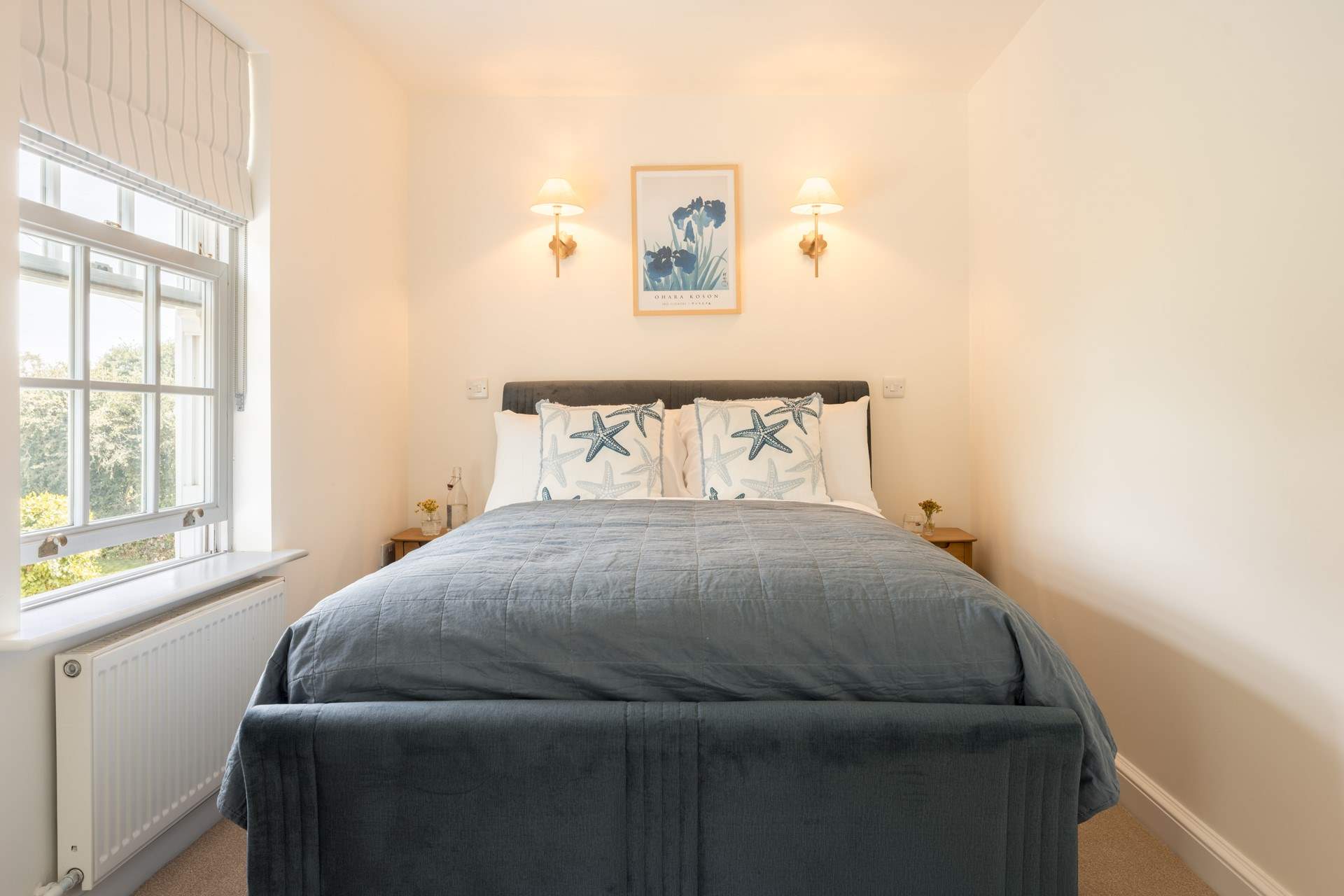 Snuggle up in this sweet bedroom.