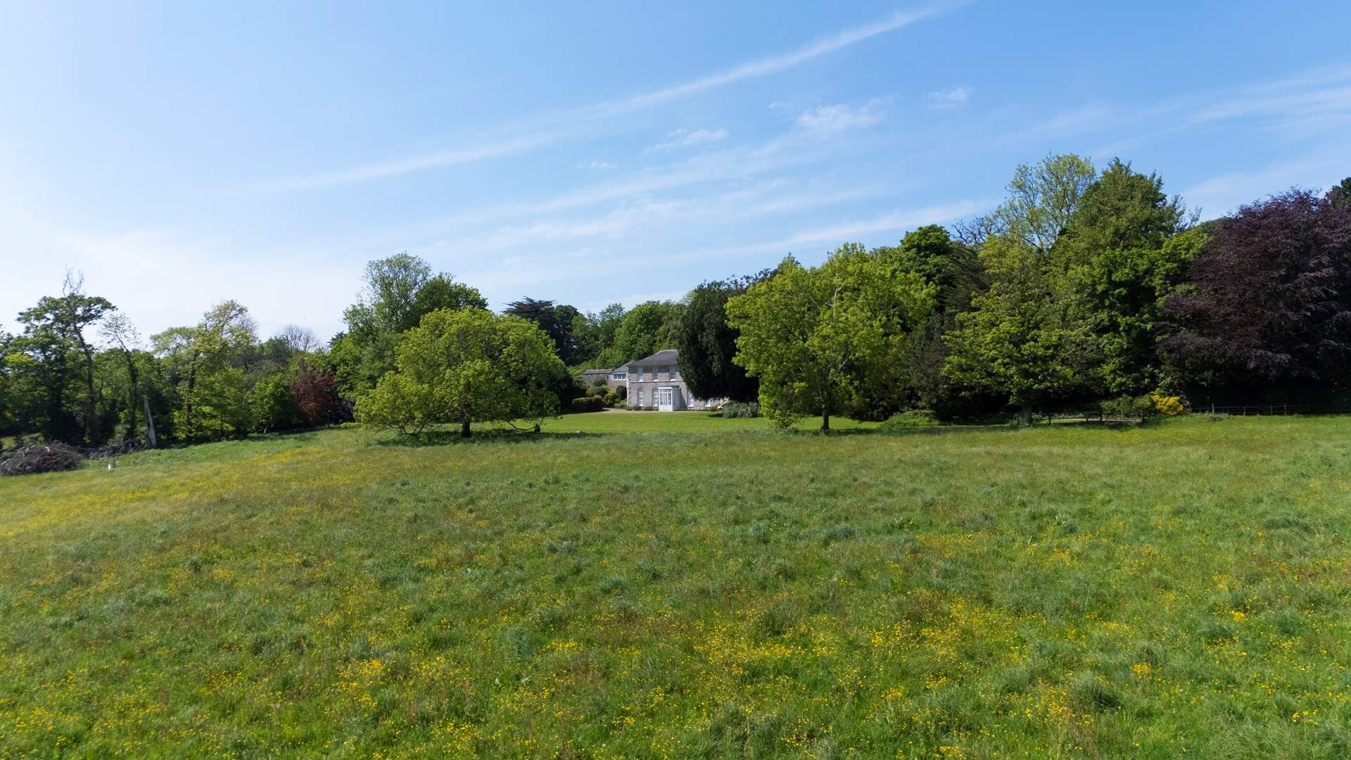 The estate is set in 25 acres of glorious gardens.