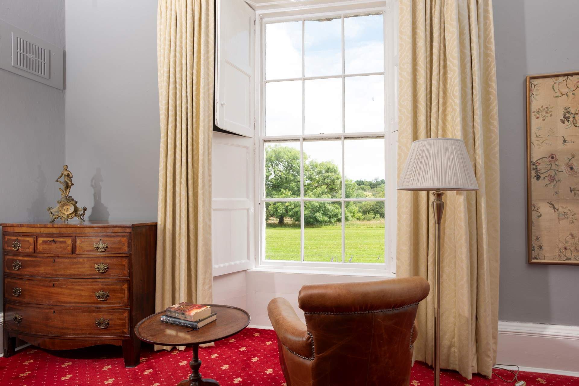 Magnificent floor to ceiling Georgian sash windows frame the beautiful views across the stunning grounds.