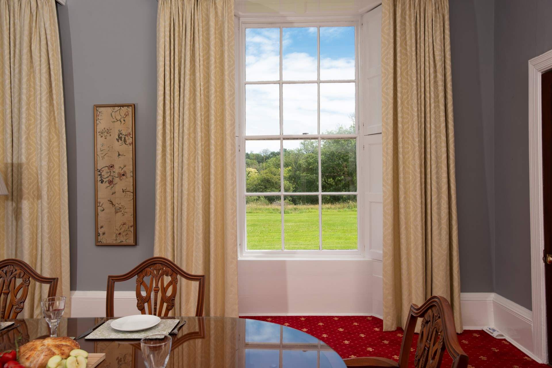 Flooded with natural light through the grand windows.