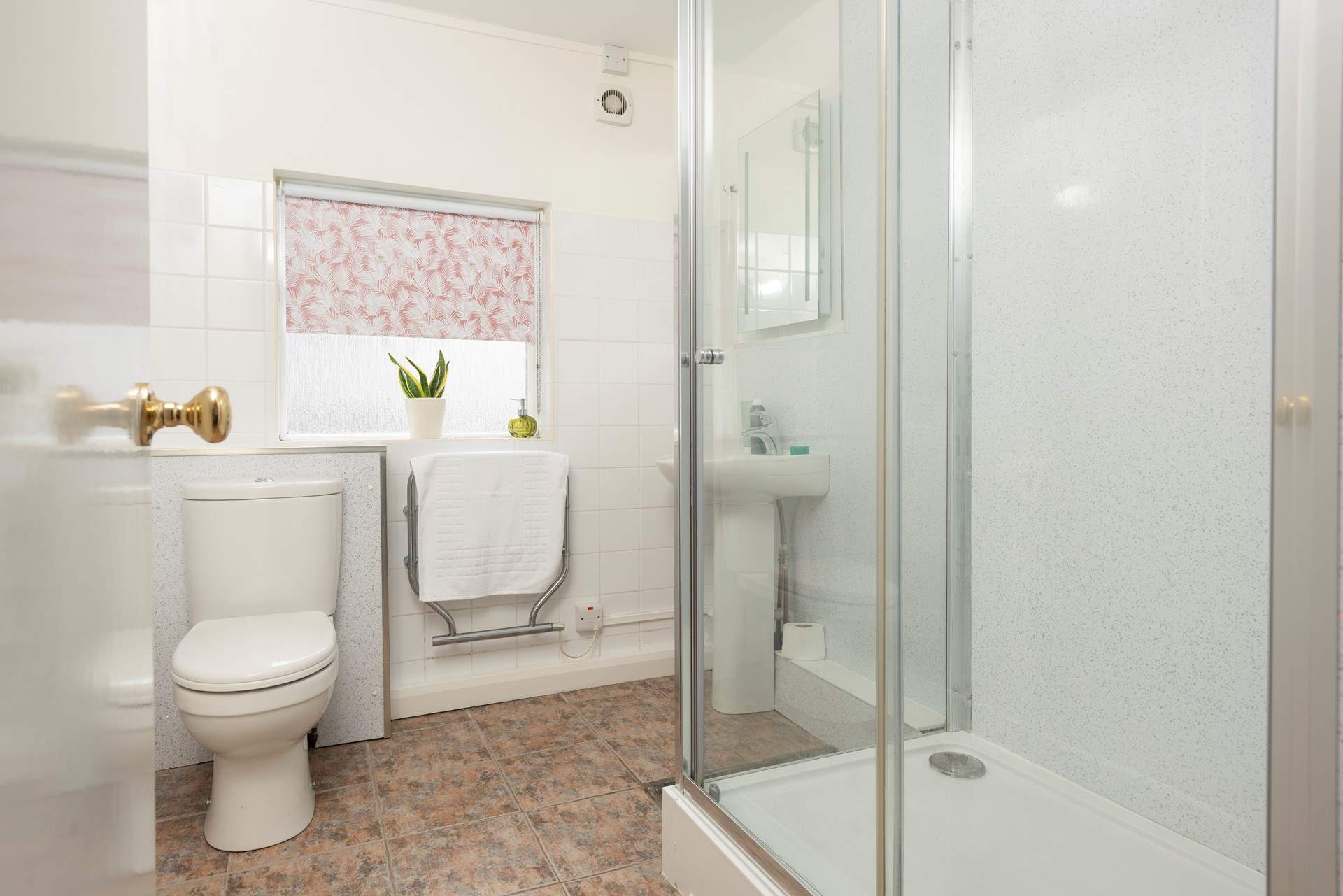 A modern shower-room for a refreshing shower after a beach day.