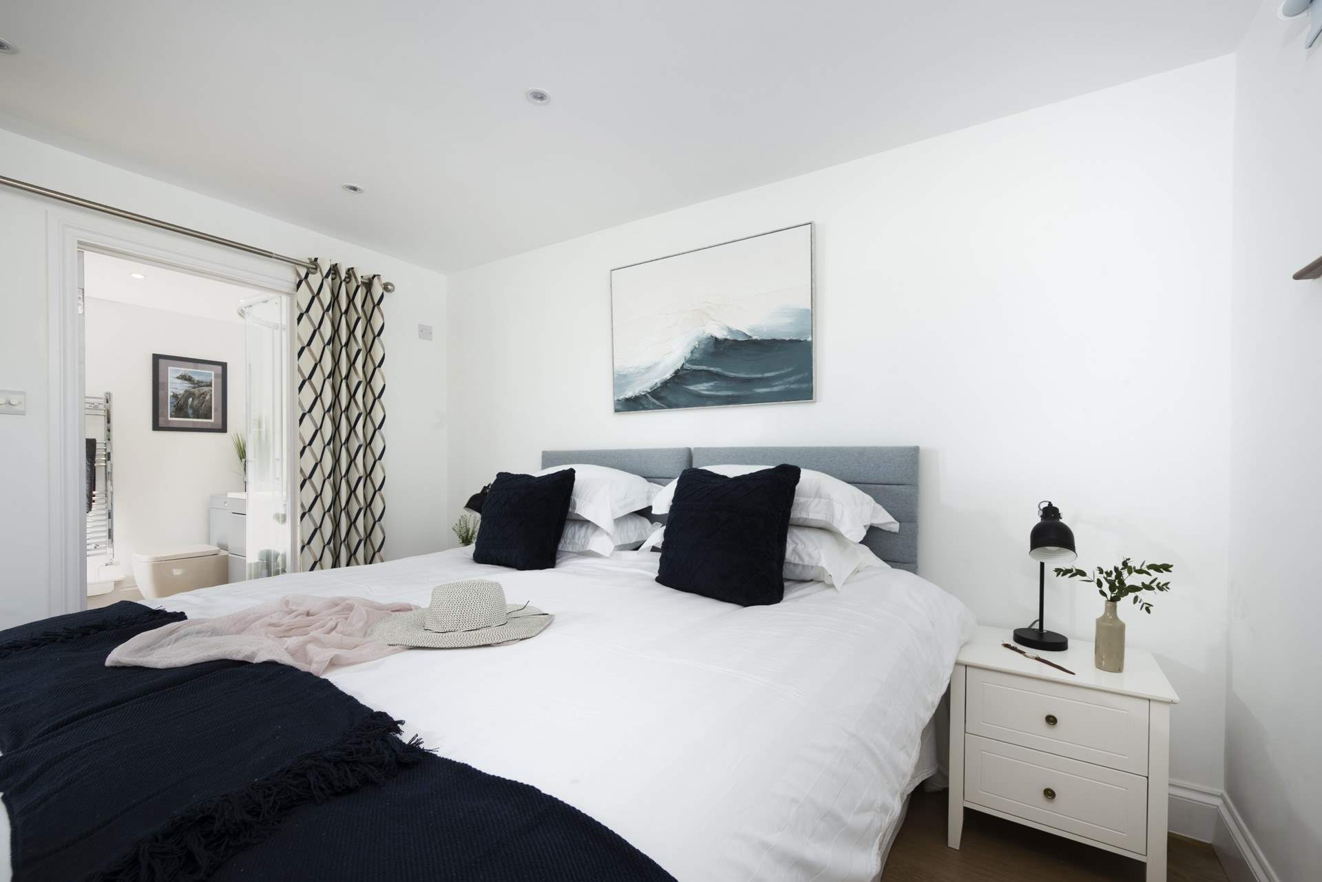 The blue tones in bedroom 2 perfectly complement the setting.