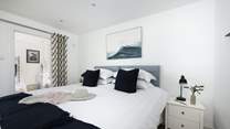 The blue tones in bedroom 2 (The Coop) perfectly complement the setting.
