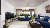 The large TV is the perfect excuse for a family film night!