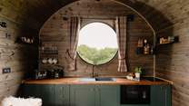 The stylish kitchen is perfectly equipped for your stay in nature.