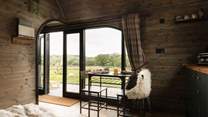 Natural light streams through the cabin from all angles.