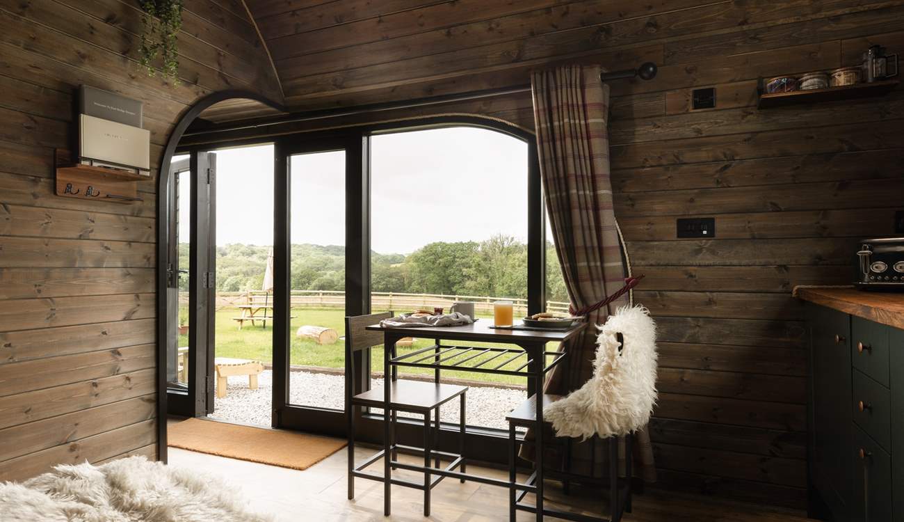 Natural light streams through the cabin from all angles.