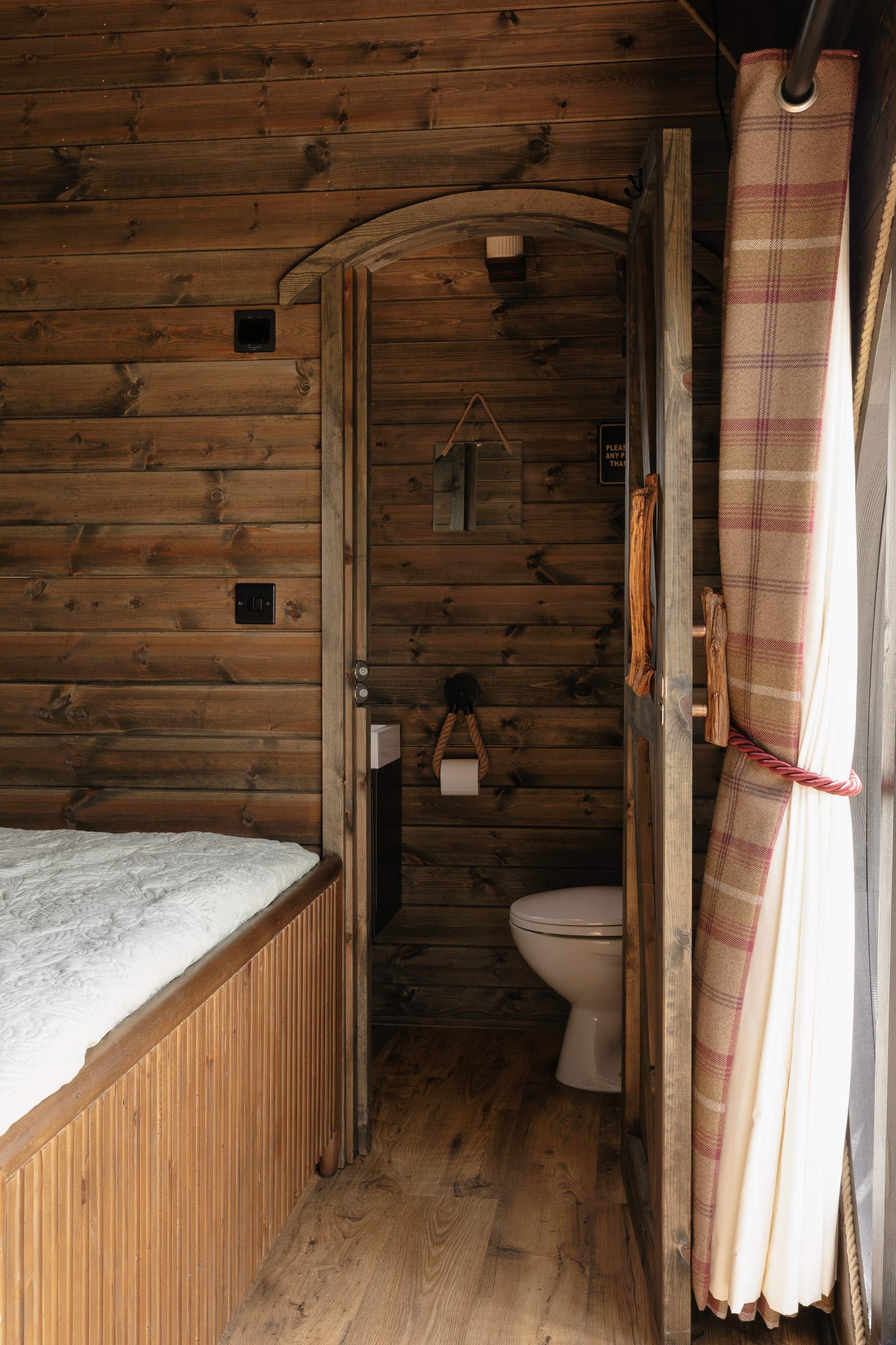You'll find the sleek shower-room just beyond the bedroom.