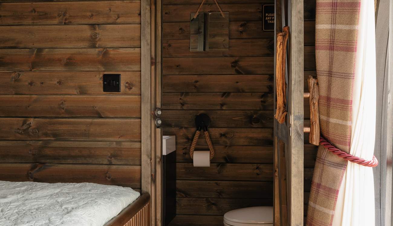 You'll find the sleek shower-room just beyond the bedroom.