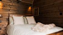 The sumptuous double bed promises sweet slumbers.