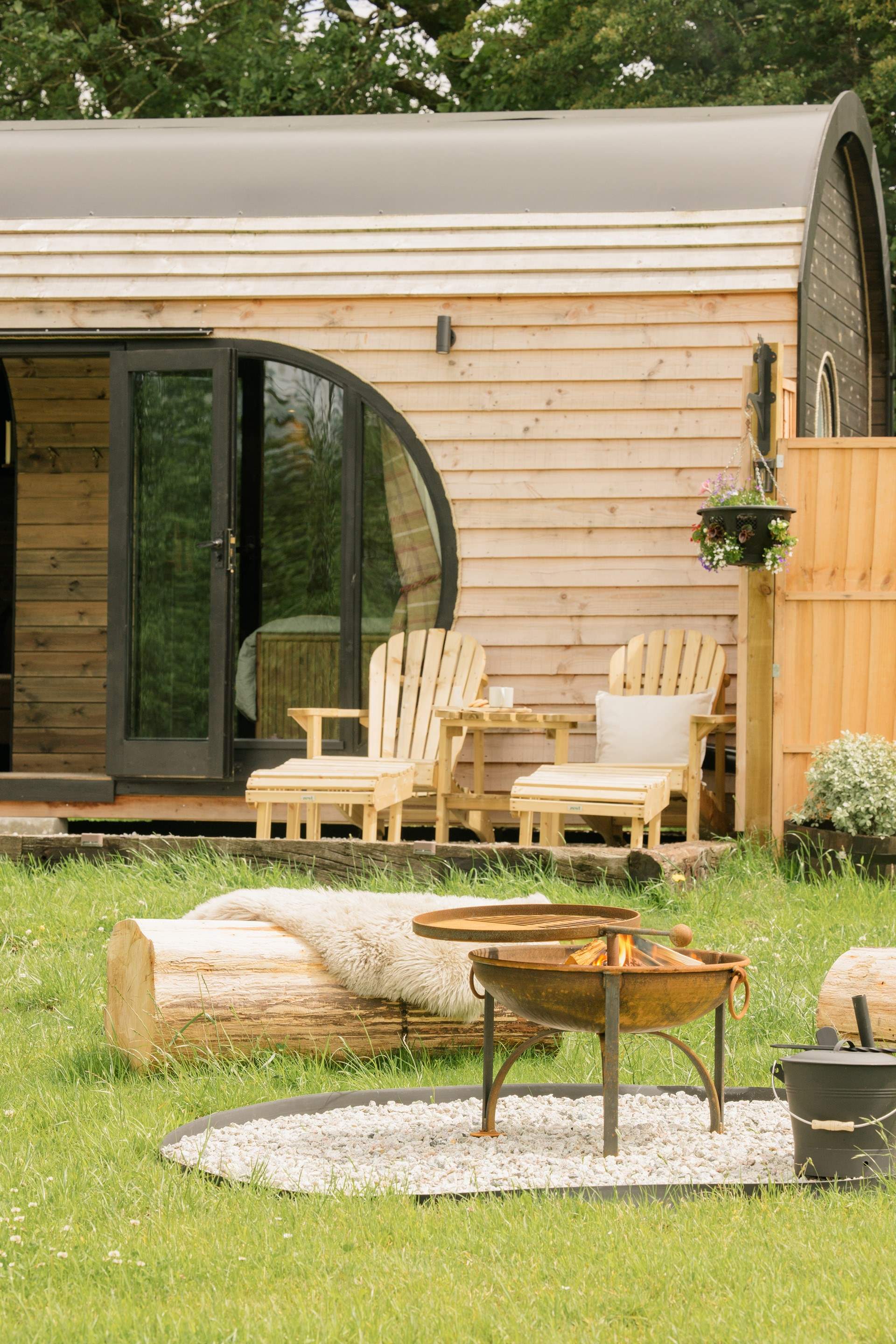 As the evening sun drops, get cosy around the fire-pit.