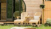 As the evening sun drops, get cosy around the fire-pit.
