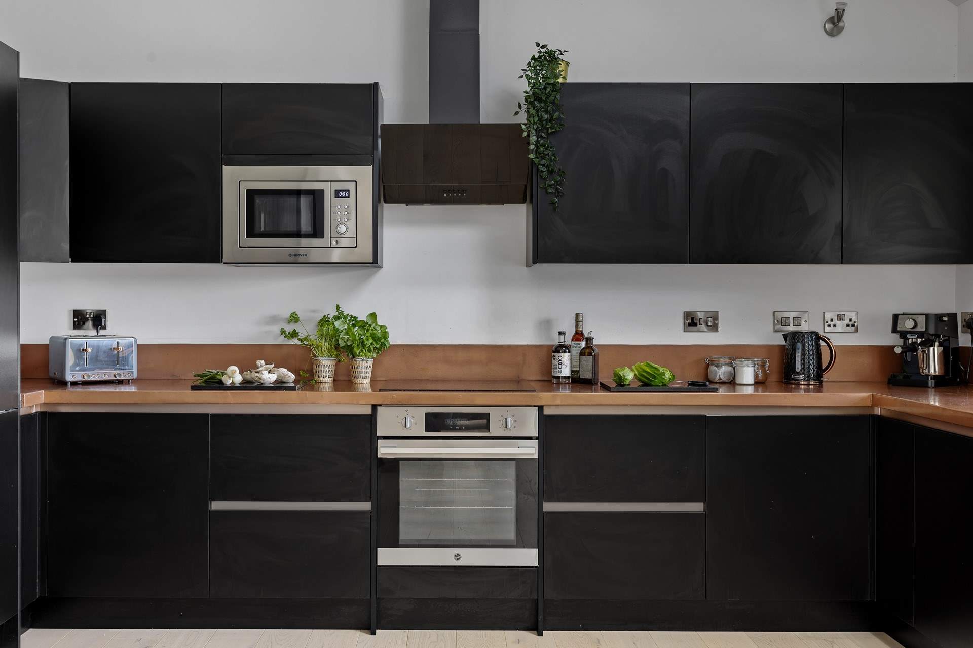 The stylish kitchen is beautifully appointed.