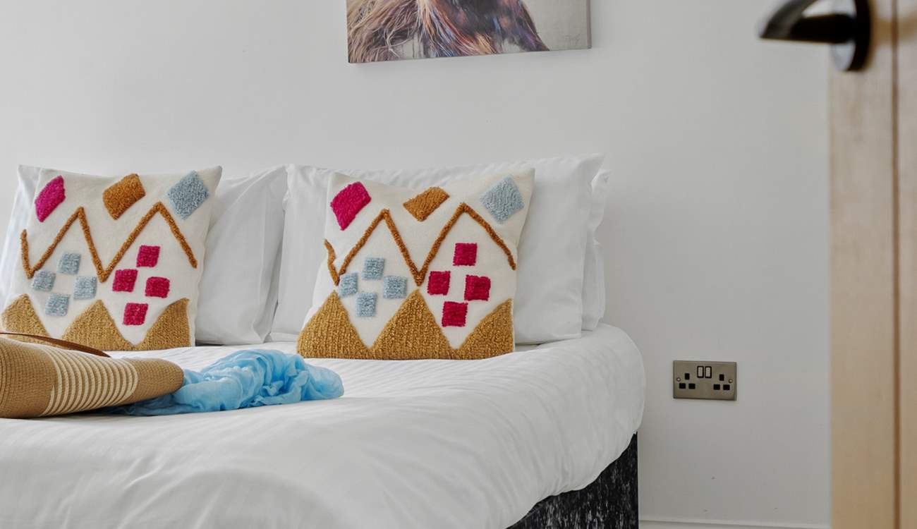 Another charming bedroom awaits.